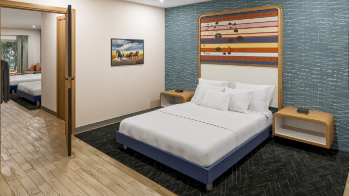 The image shows a modern hotel room with a double bed, two nightstands, a painting on the wall, and an open door leading to an adjoining room.