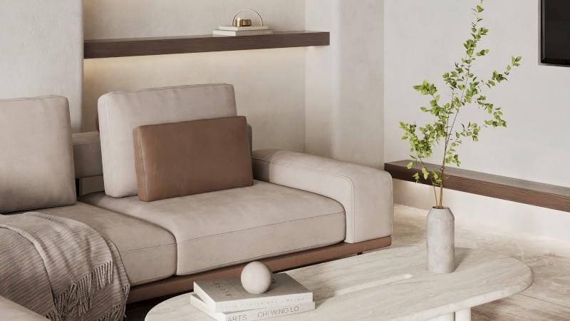 A modern living room with a light sofa, coffee table, shelves, and decorations. Neutral tones create a cozy, minimalist vibe.